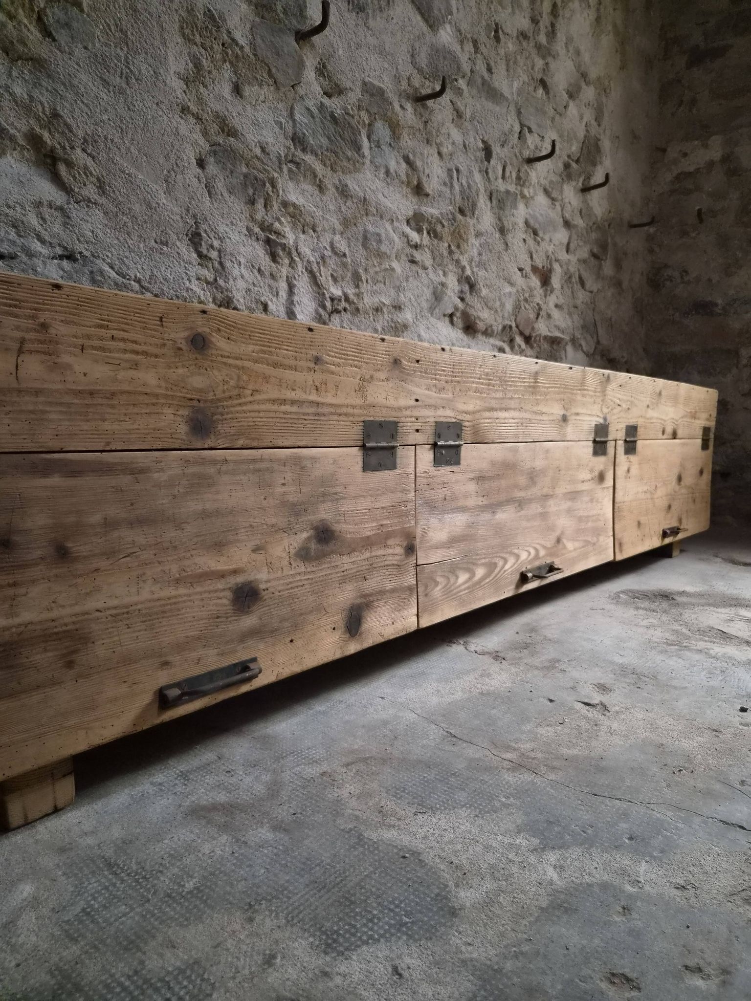 Old French industrial workshop furniture in pine / storage bench, circa 1880–1900