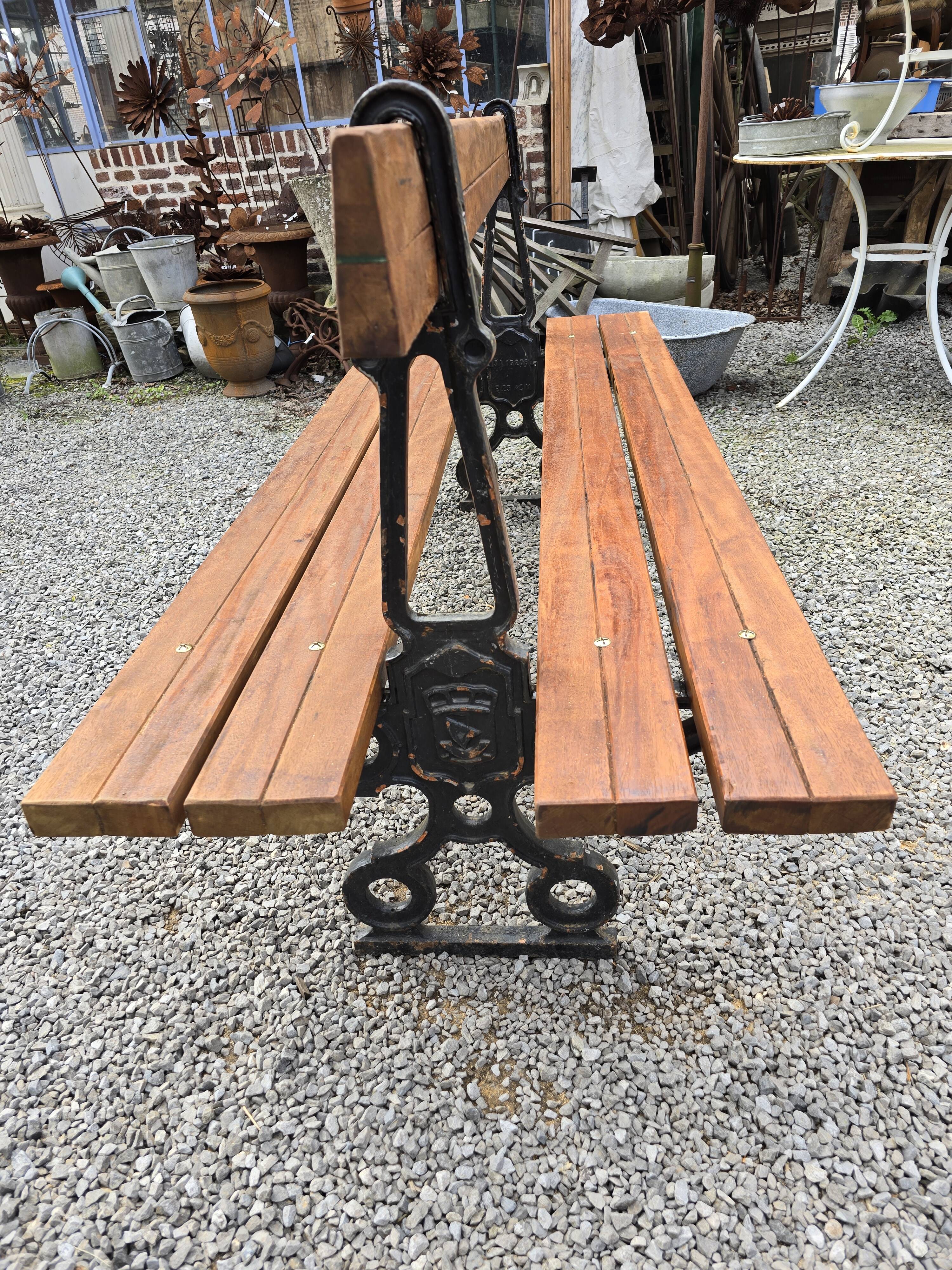 Public garden bench in the city of Paris