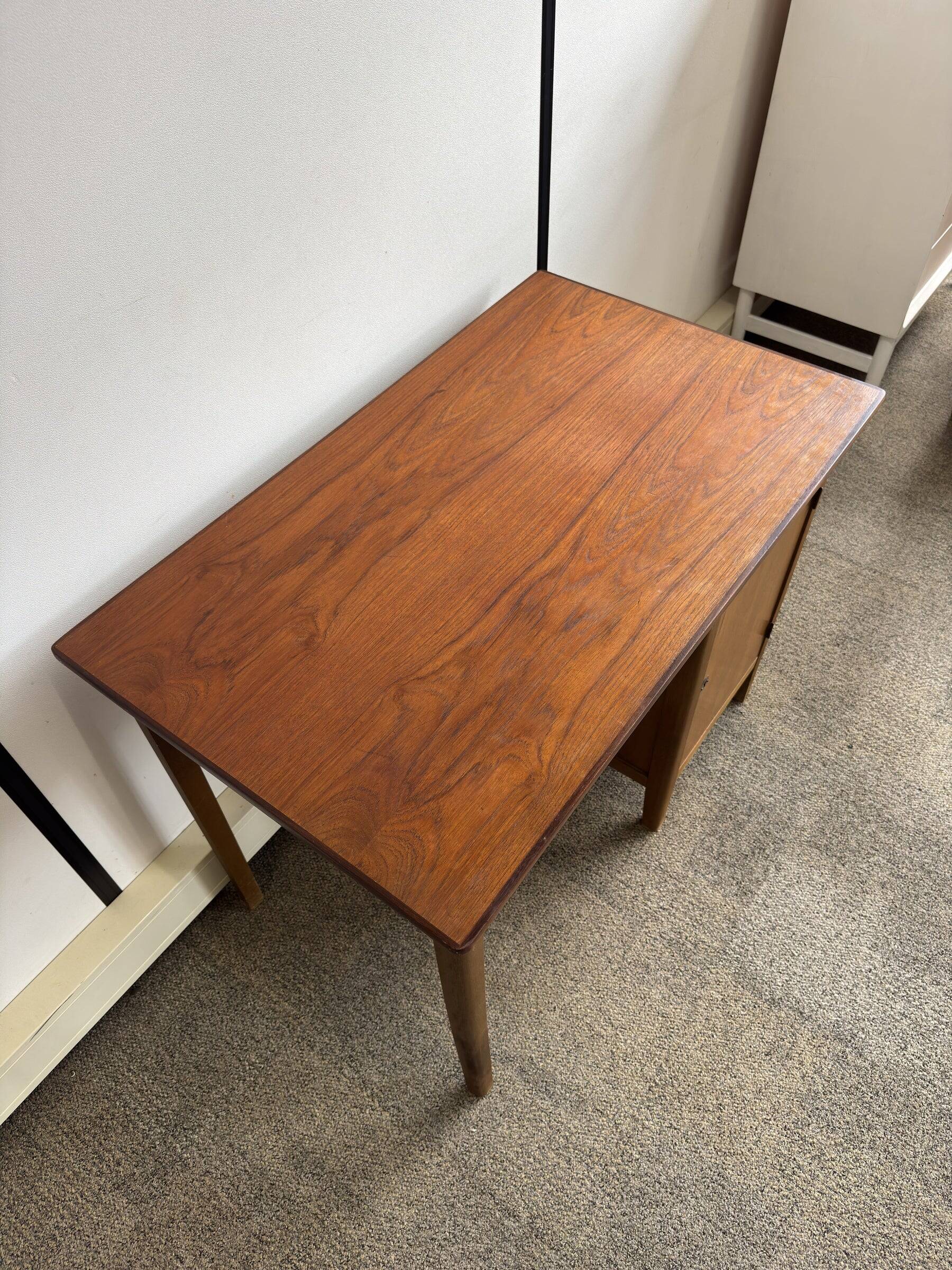 Vintage Danish desk from the 1960s with a drawer and cupboard.