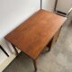 Vintage Danish desk from the 1960s with a drawer and cupboard.