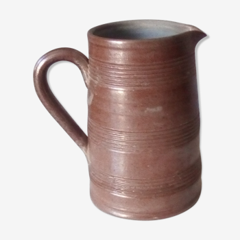 Vintage pitcher in glazed sandstone