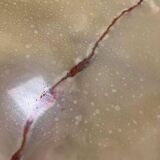 Vintage round coffee table: onyx top & gold brass structure