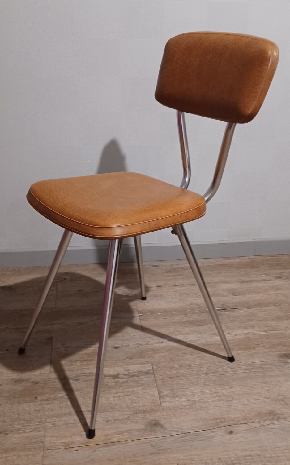 Pair of vintage faux leather and chrome chairs