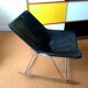 Fauteuil cuir G1, bascule. Pierre Guariche édition Maison du Monde