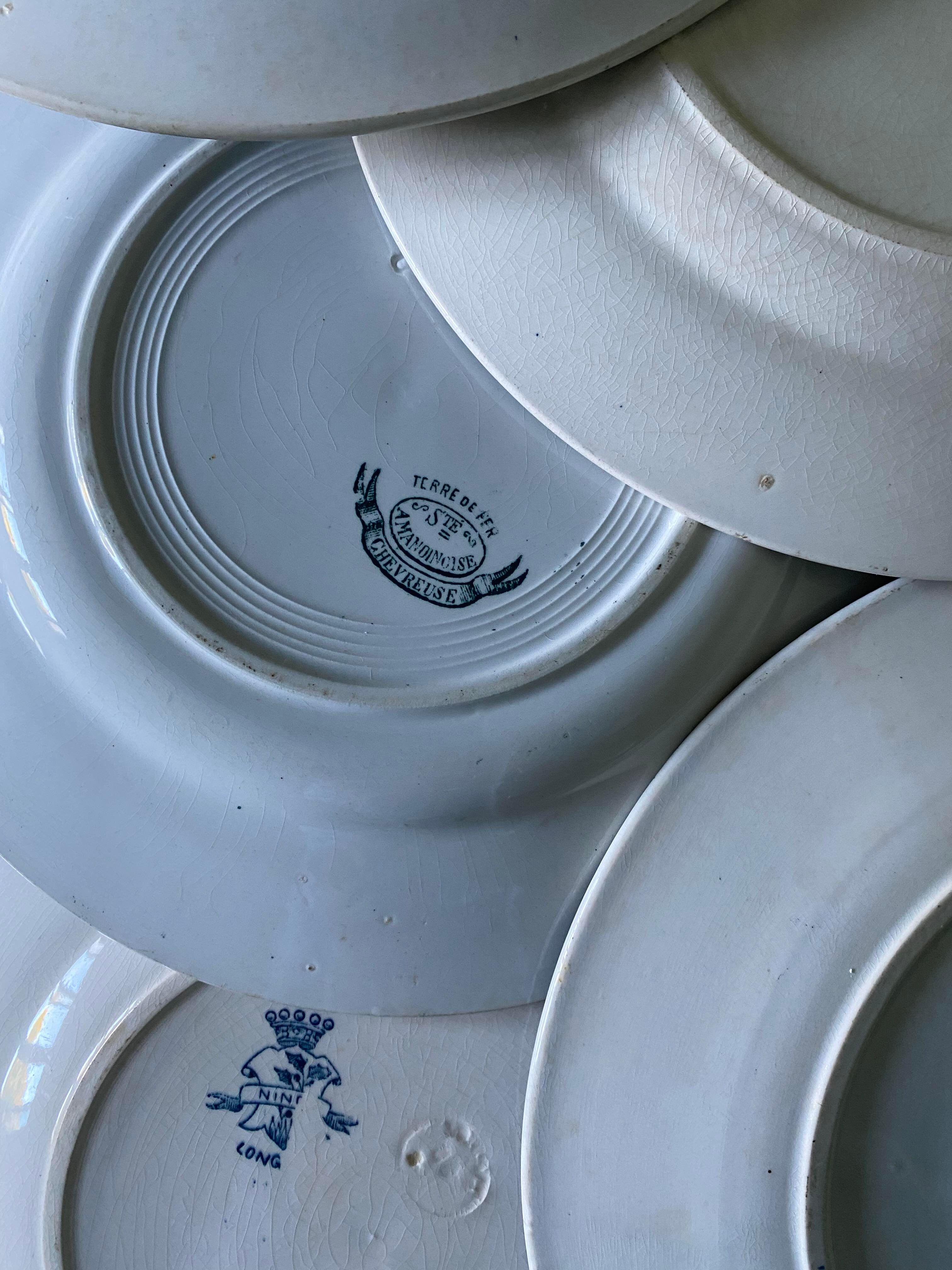Set of 6 old flat plates in mismatched iron earth