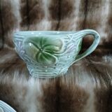 Antique cup and saucer in majolica.