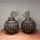 Paire d’appliques murales globes à facettes multicolores
