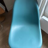 4 Eames chairs in turquoise blue color