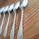 Small old silver metal spoons