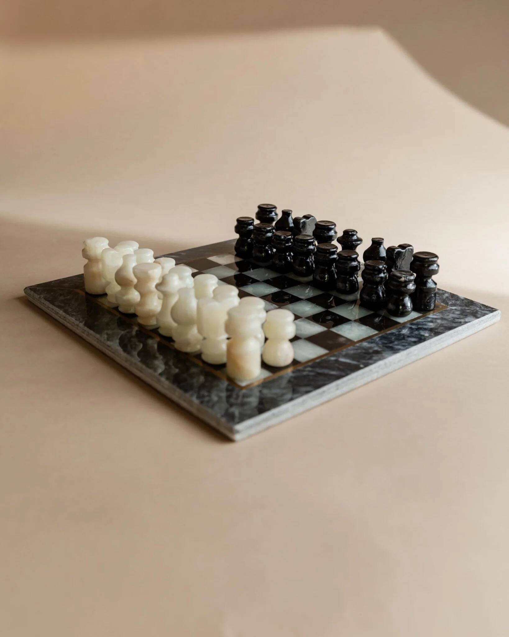 Vintage Marble Chess Set in Black and Cream Stone with Hand-Carved Pieces, Italian 1960s