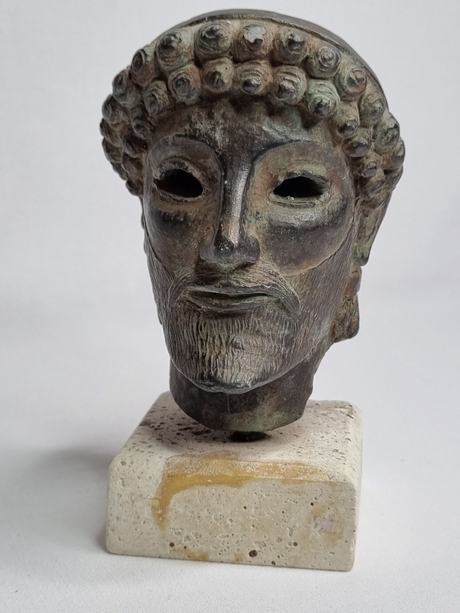 Head of Zeus in patinated plaster in imitation of bronze, 15 cm