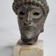 Head of Zeus in patinated plaster in imitation of bronze, 15 cm
