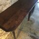 Oak console and walnut feet