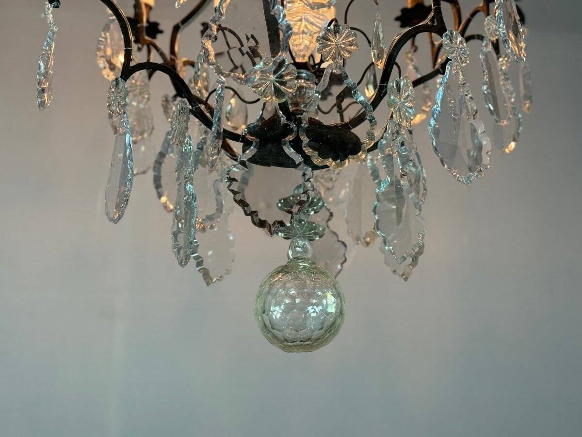 Black patinated bronze cage chandelier decorated with cut crystal pendants circa 1900