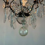 Black patinated bronze cage chandelier decorated with cut crystal pendants circa 1900