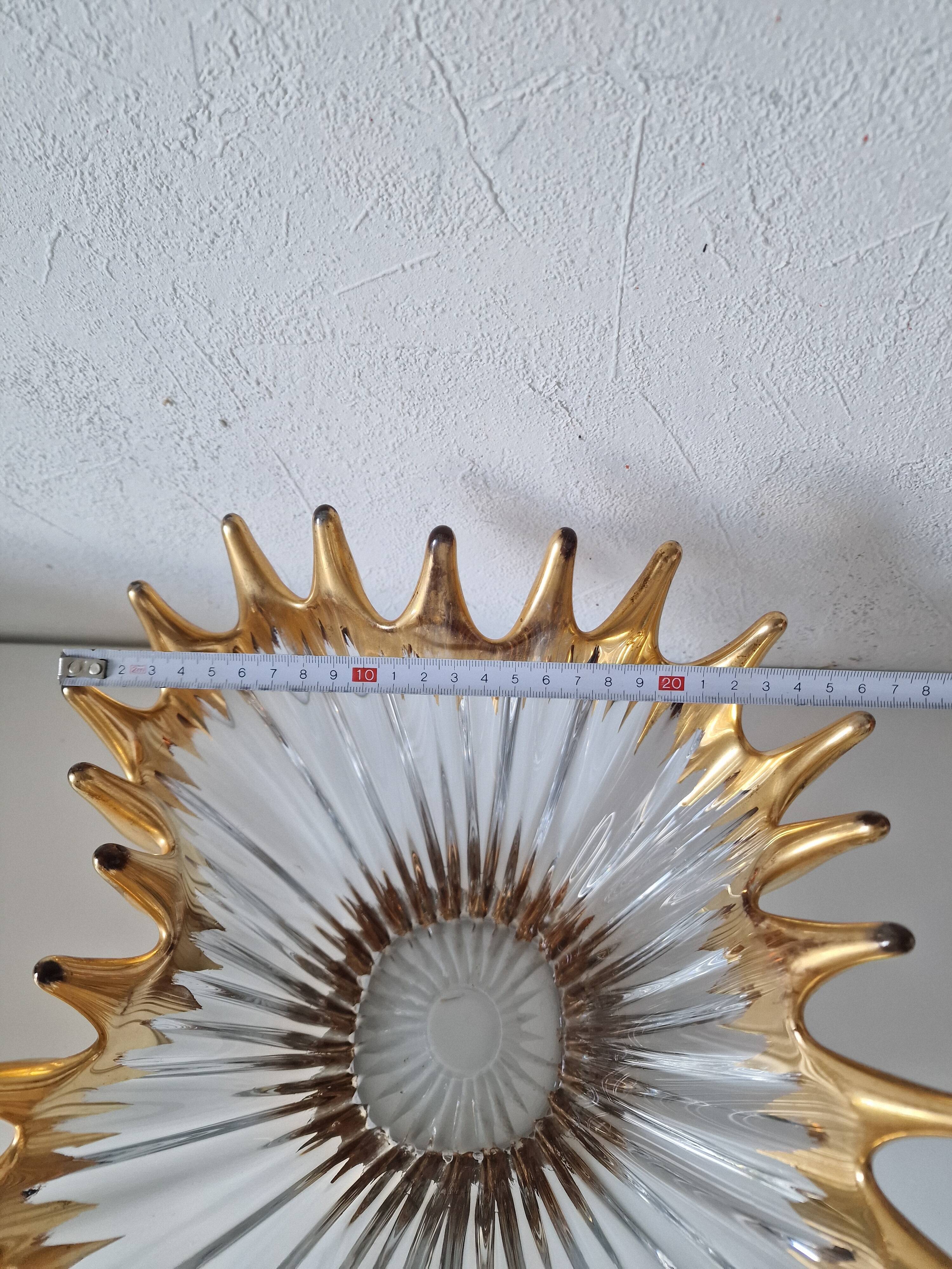 Large vintage crystal bowl from BAYEL with golden tips.