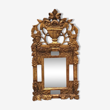 Regency style beaded mirror in carved and gilded wood, early 19th century