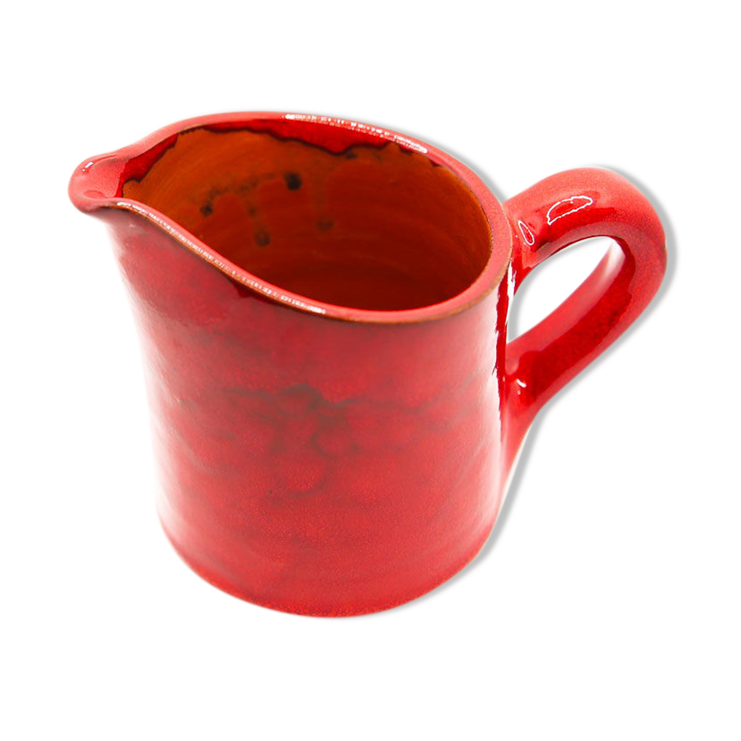 Bright red ceramic pitcher