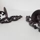 Antique wall candle holder in enamelled cast iron