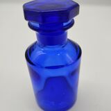 Old perfume bottle in cobalt blue glass