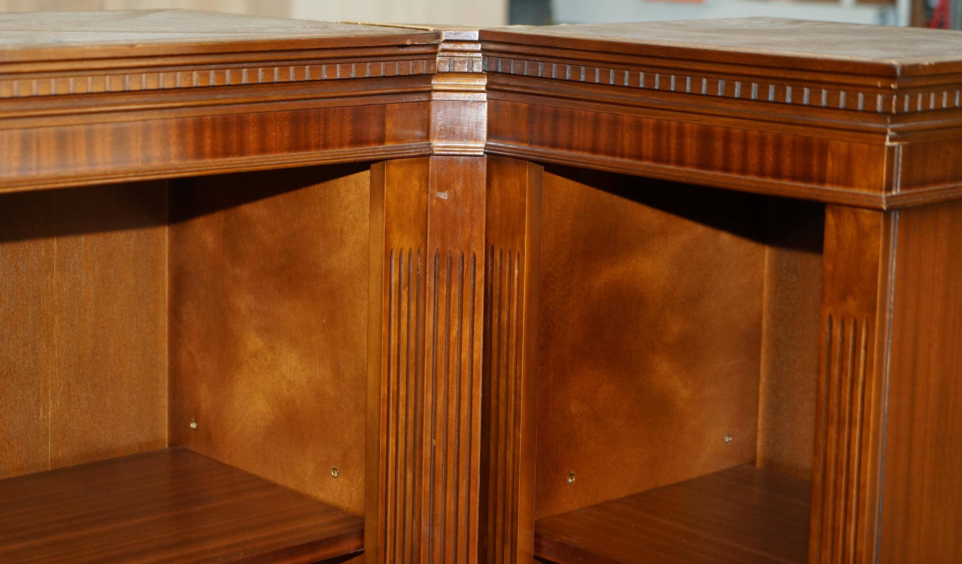 Corner library made of flamed hardwood, in 3 parts.
