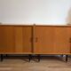 Pair of modular modernist buffets as a bookshelf.