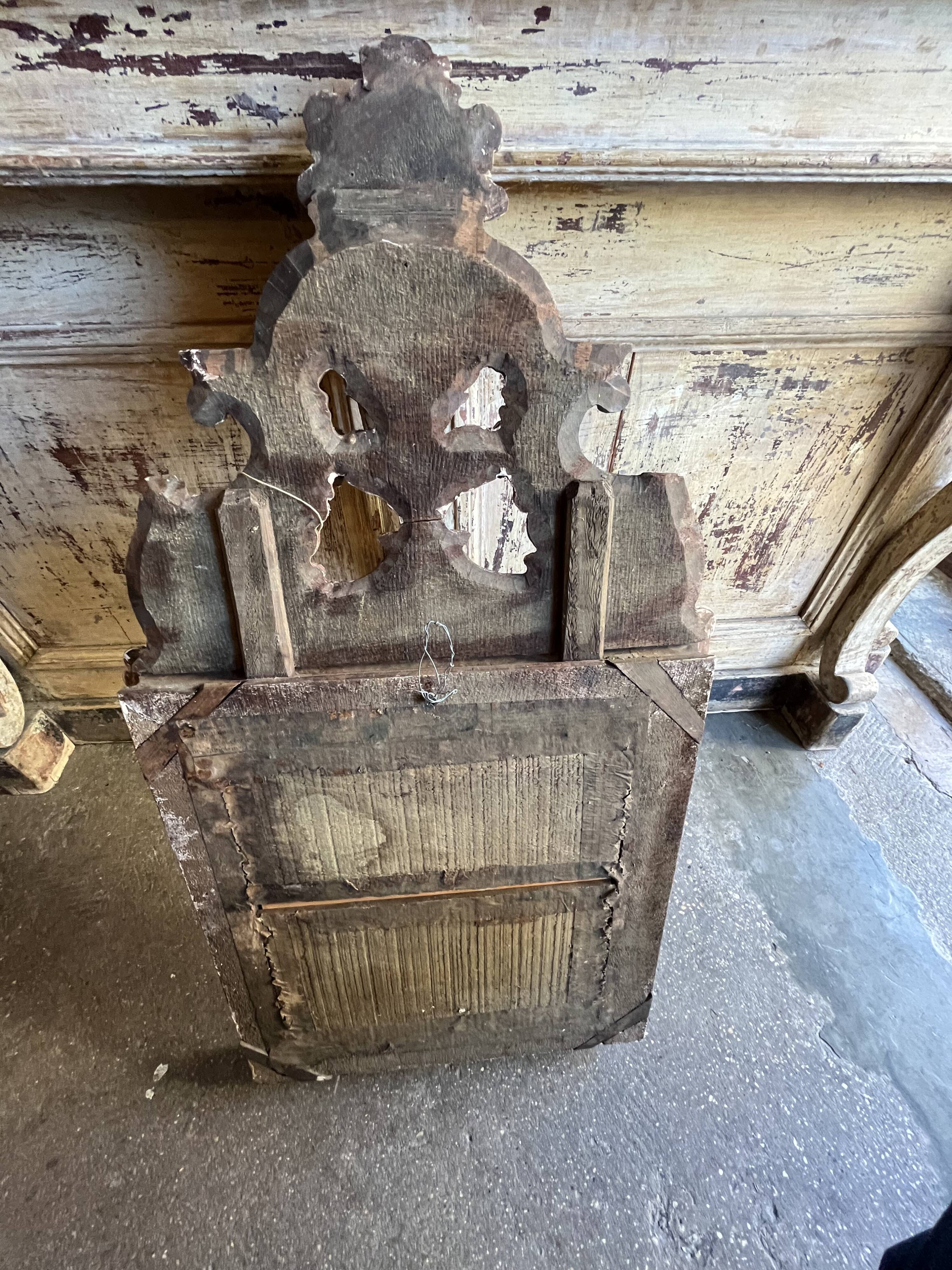 Carved wooden mirror