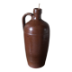 Vintage stoneware liqueur bottle with handle and spout.