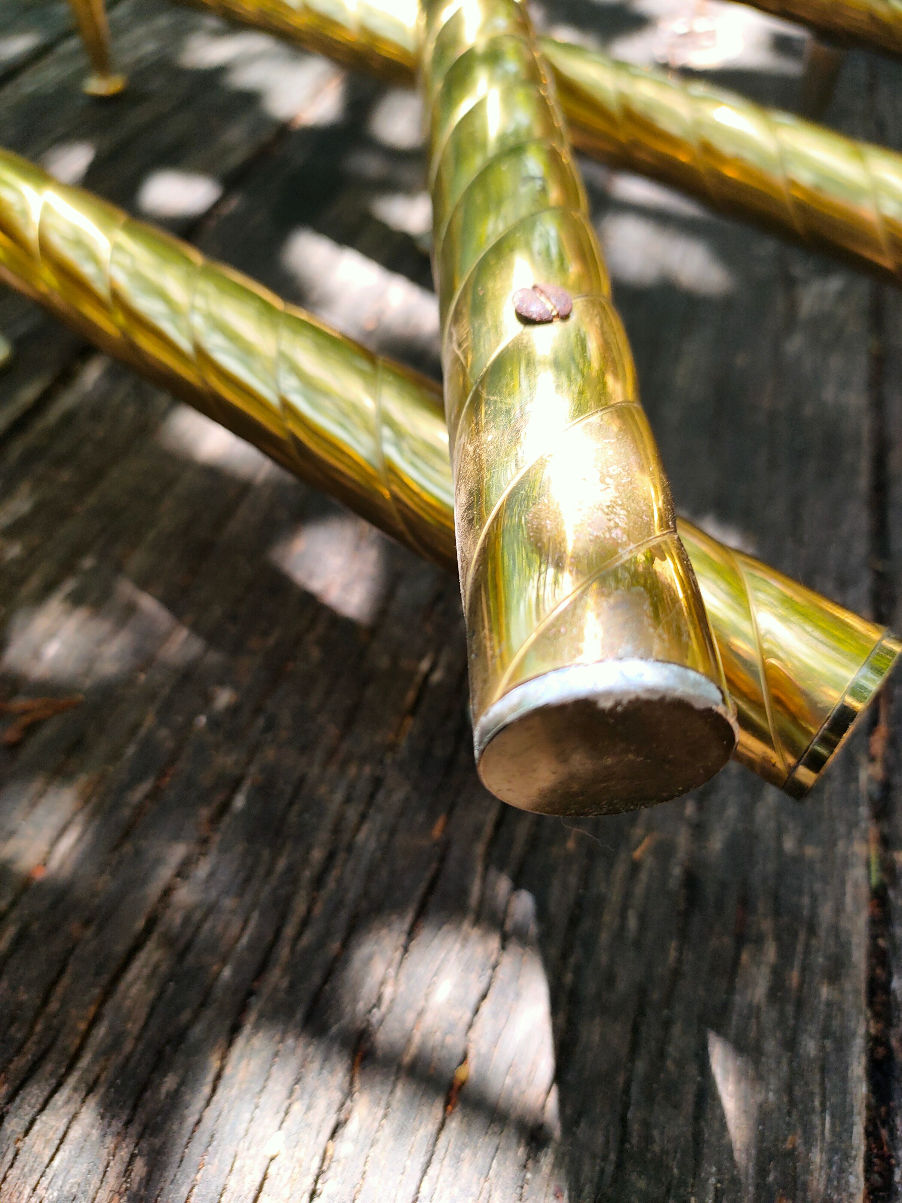Wall coat rack in gilded metal