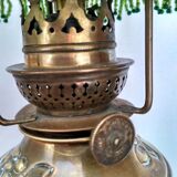 Brass lamp "La Parisienne" at the end of the 19th century.