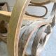 Rocking chair with a cane seat and backrest.