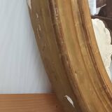 Antique oval gilded stucco mirror