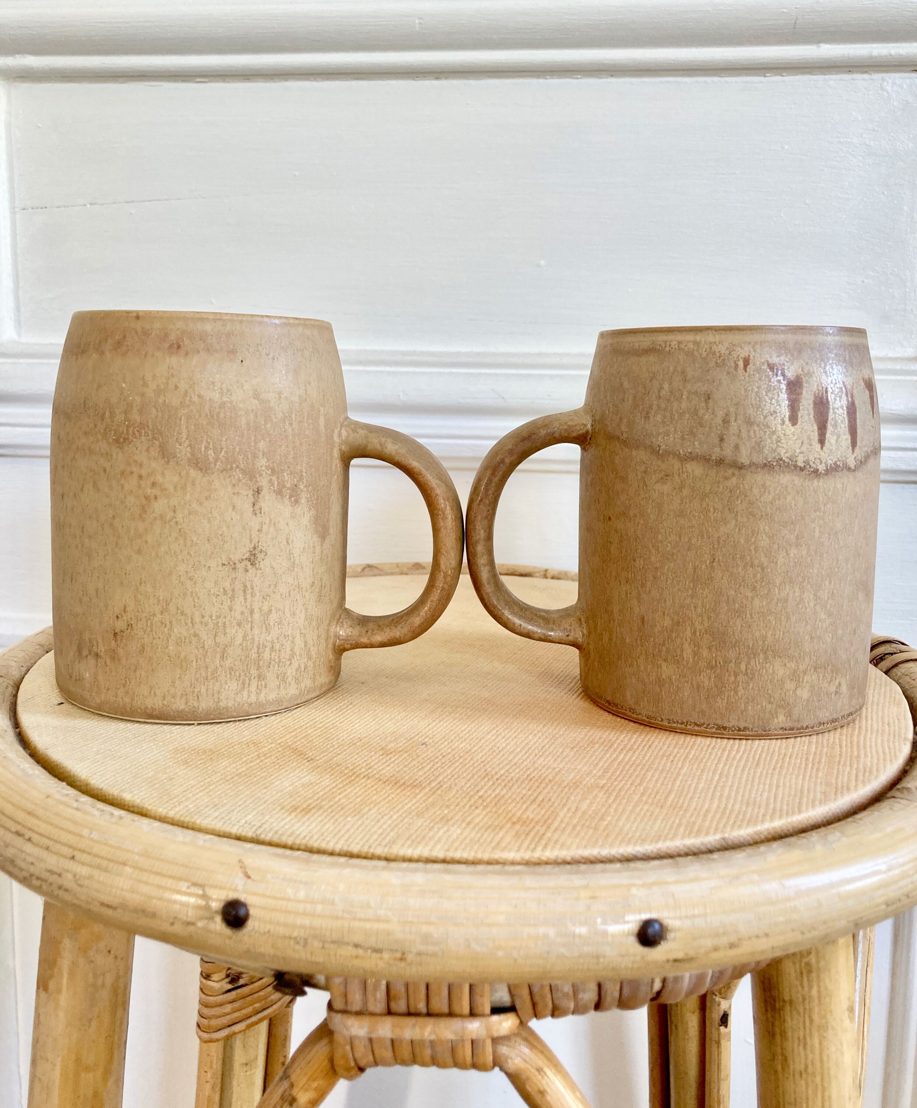 Duo of sandstone mugs