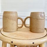 Duo of sandstone mugs