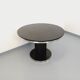 Vintage dining table in melamine with a black wood effect and chrome metal.