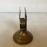 Antique brass match holder with tulip base.