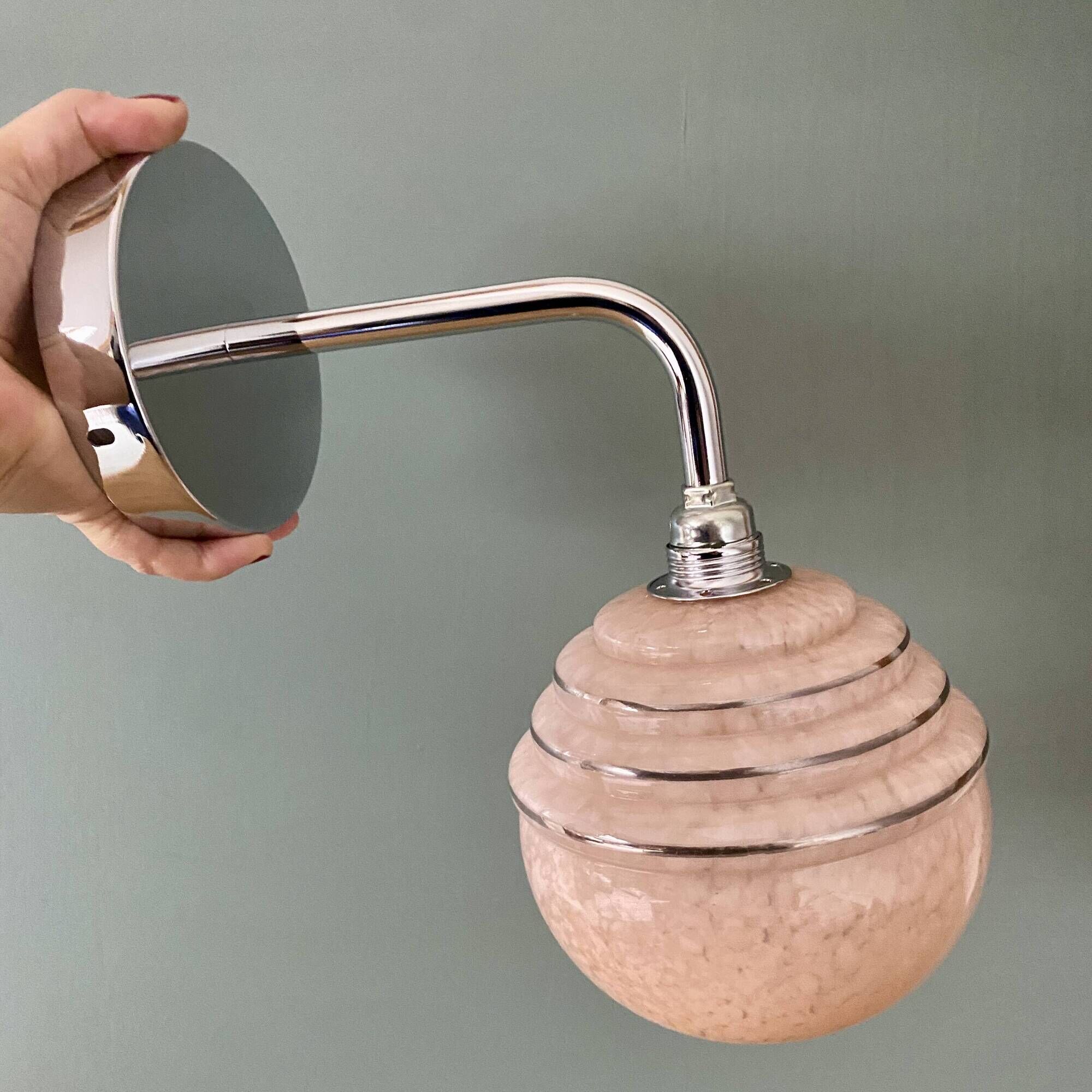 Vintage golden globe elbow wall light in pink and silver Clichy glass