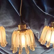 3 suspensions Doria en verre ambré, années 1960