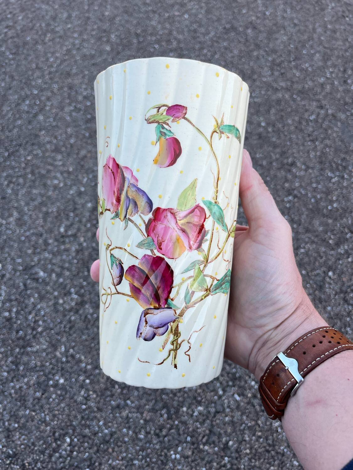 Antique twisted earthenware vase circa 1920, decorated with flowers