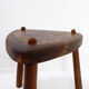 Rustic tripod stool with a triangular seat, 1960s.