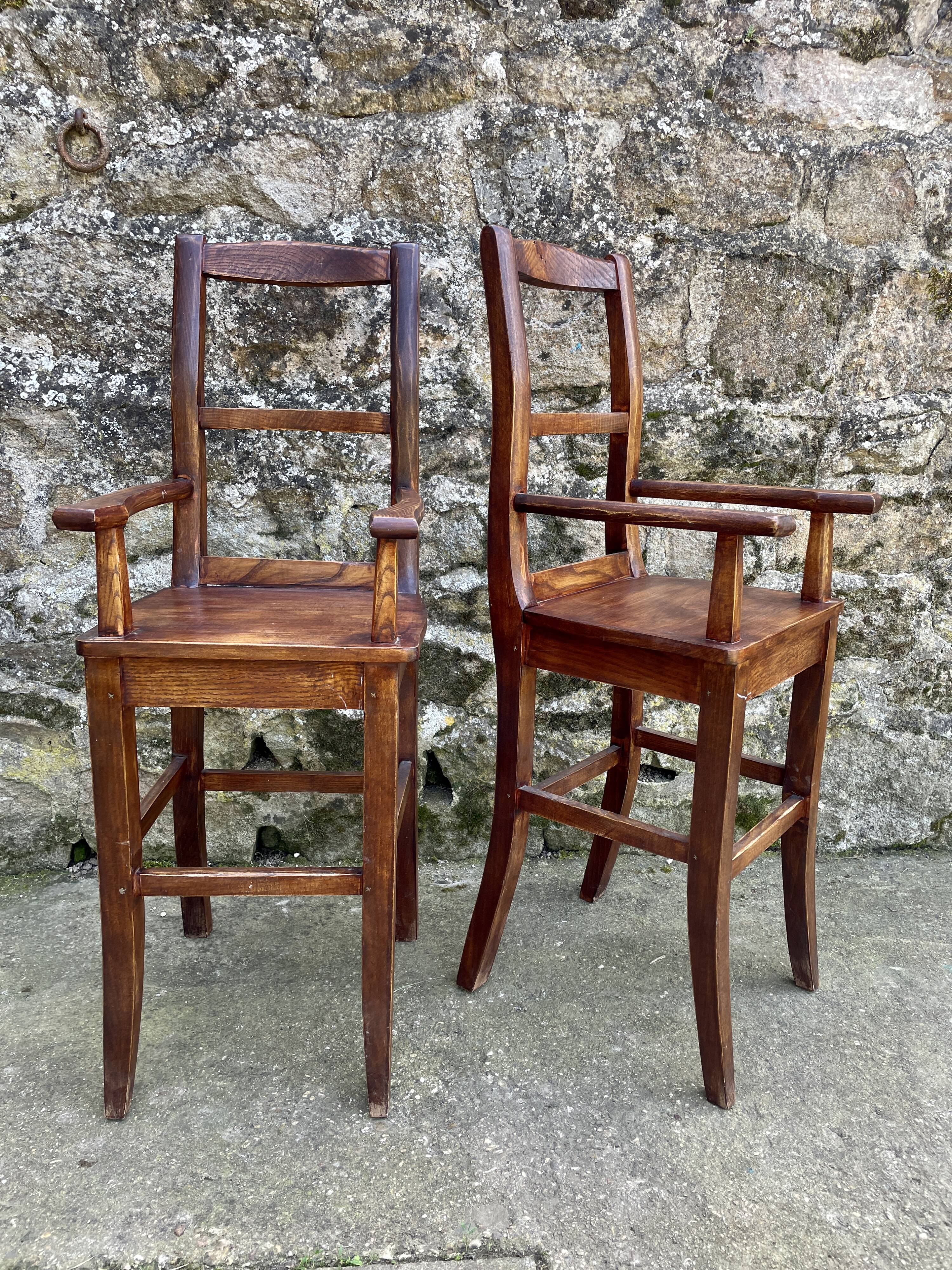 Pair of children's high chairs, early 20th century craftsmanship.