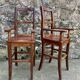 Pair of children's high chairs, early 20th century craftsmanship.
