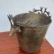 Antique champagne cooler with stag heads