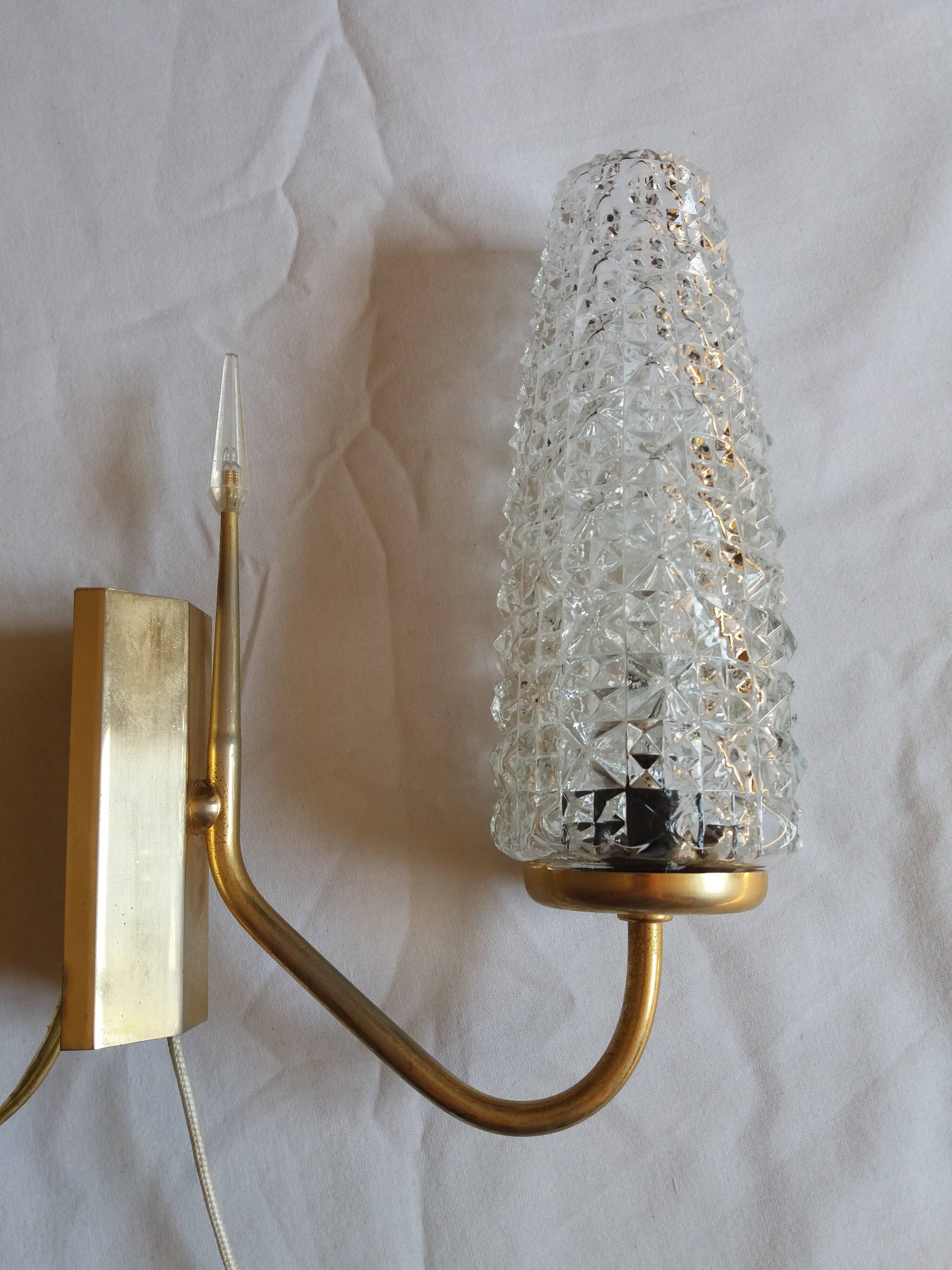 Brass wall lamp and pineapple glass