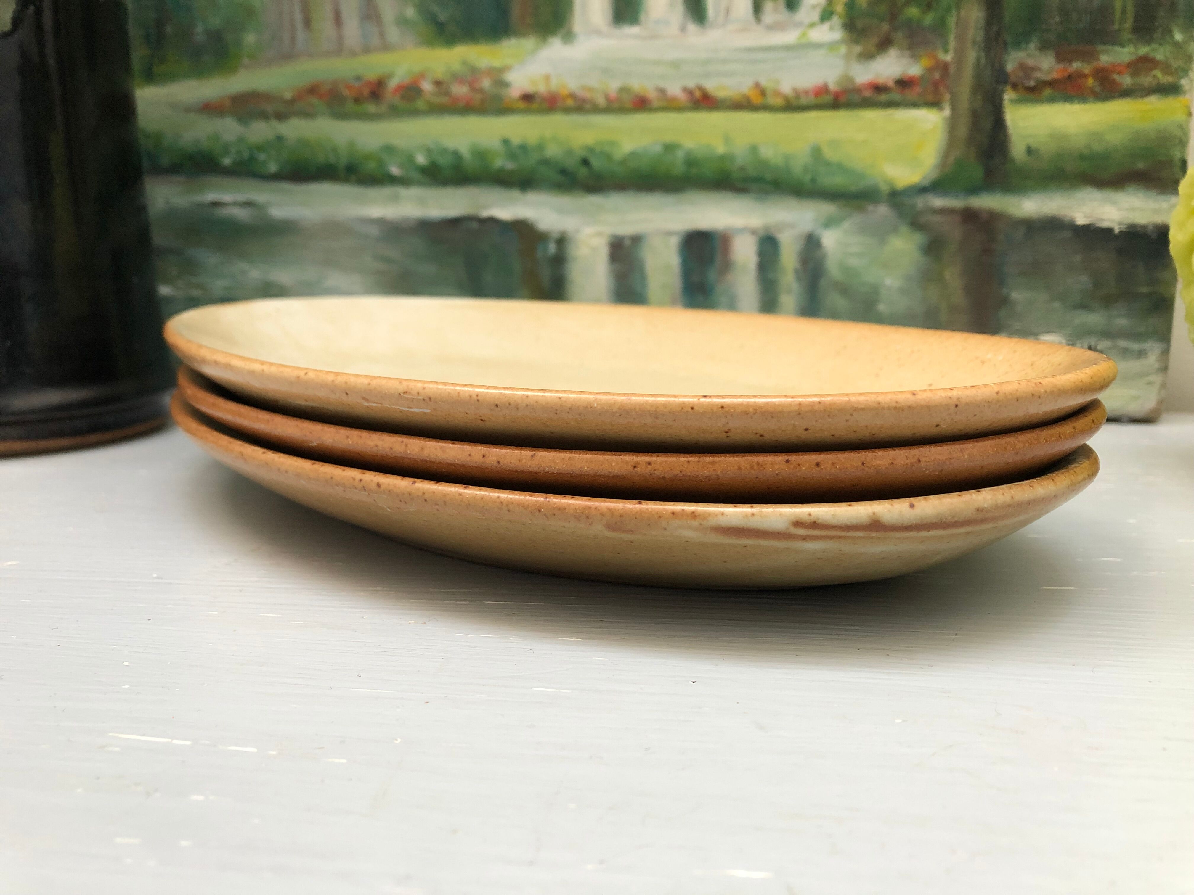 Set of three stoneware dishes village france