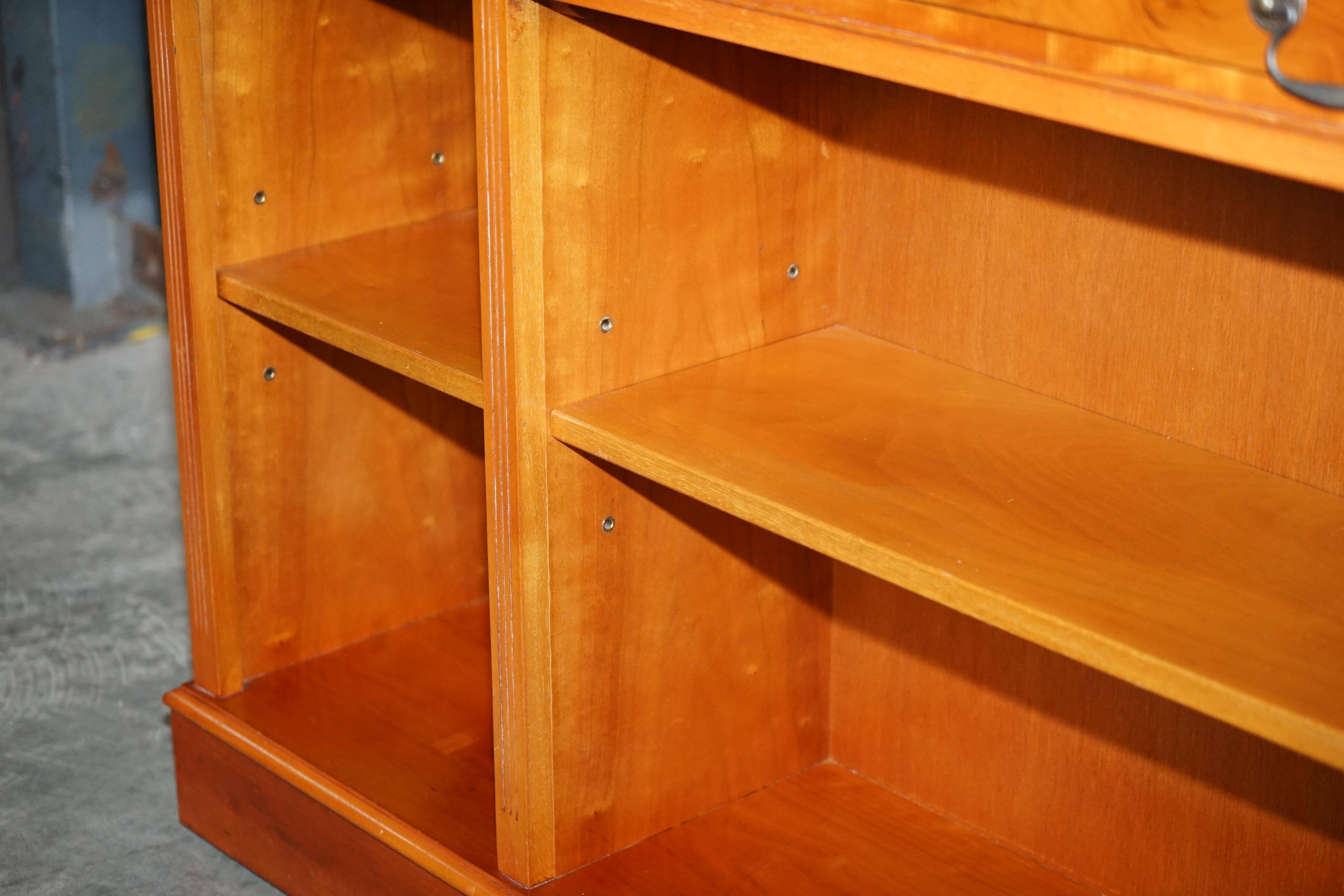 Vintage yew wood library/buffet with three drawers.