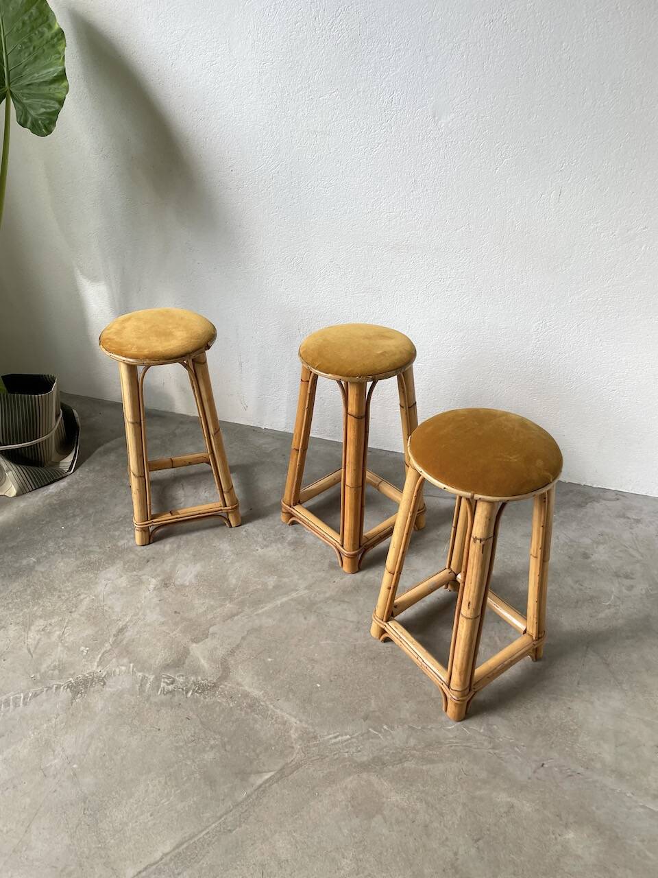 Set of three rattan high stools