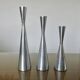 Series of 3 Scandinavian "diabolo" candlesticks in aluminum 1970