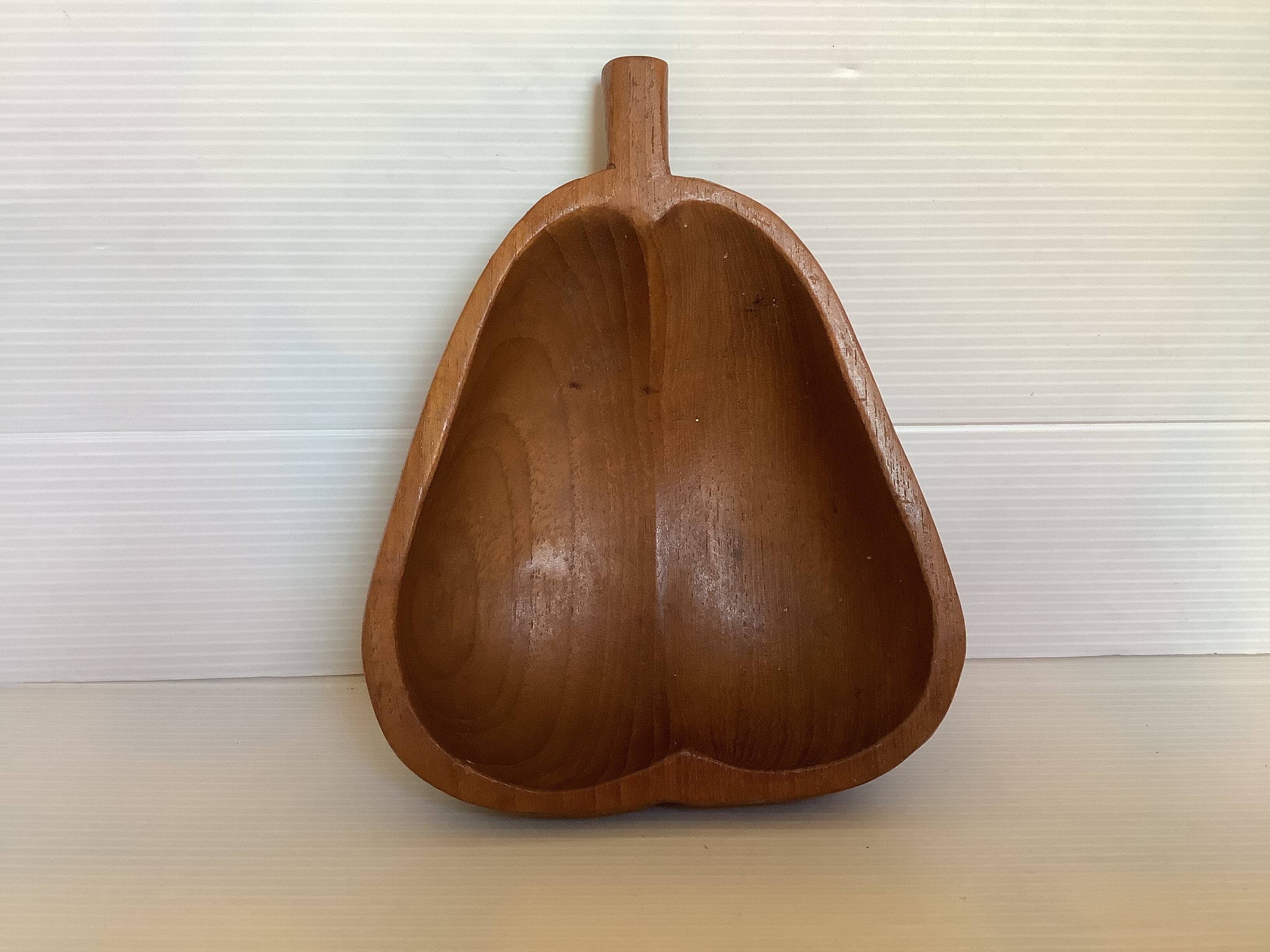 Empty exotic wood pear pocket