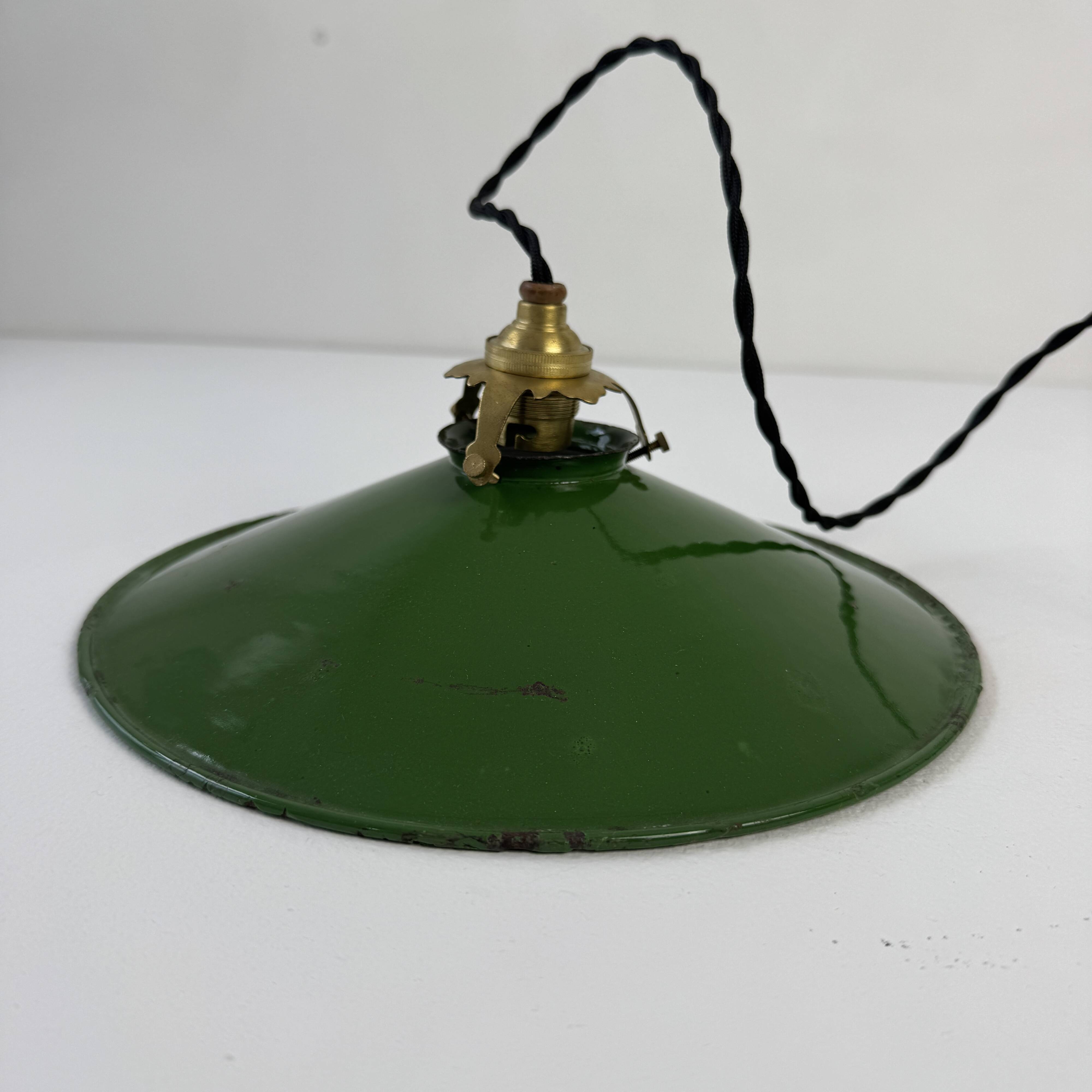 Old conical industrial pendant light in green enamelled sheet metal